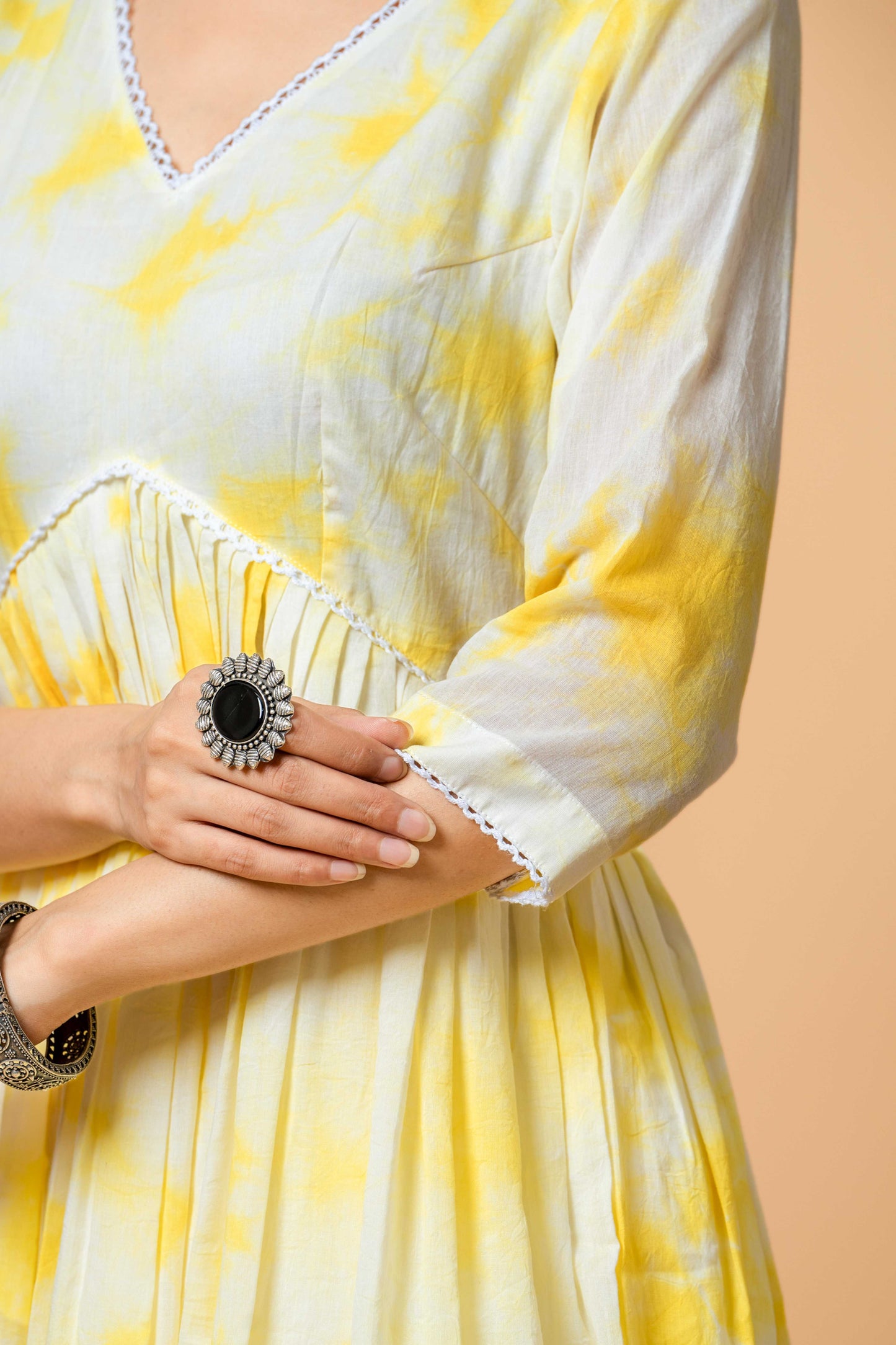 close-up of yellow tie-dye fabric texture