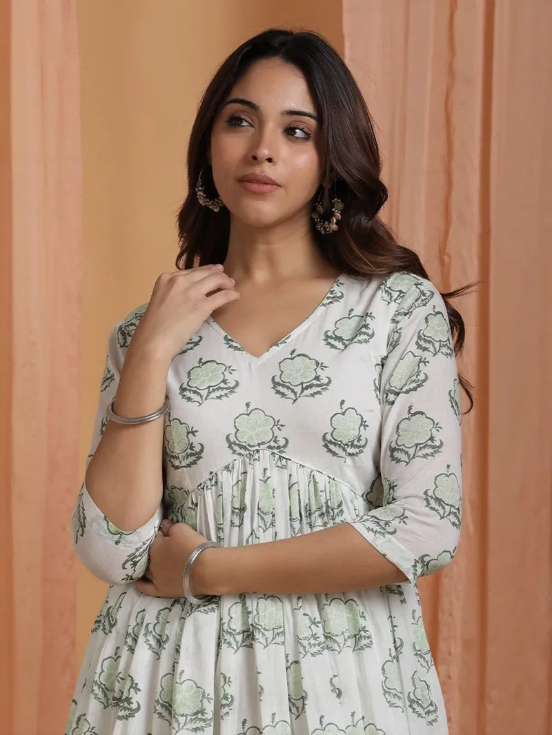 close‑up of traditional green hand block motifs on cotton fabric