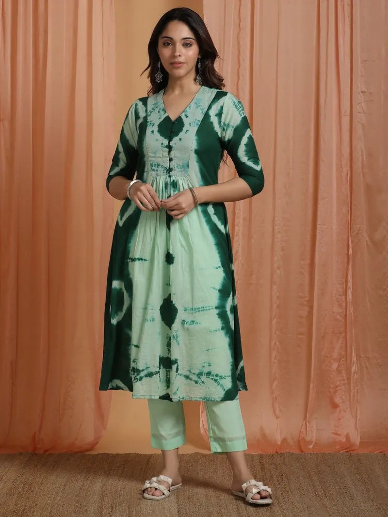 model wearing SIVI green mulmul suit set
