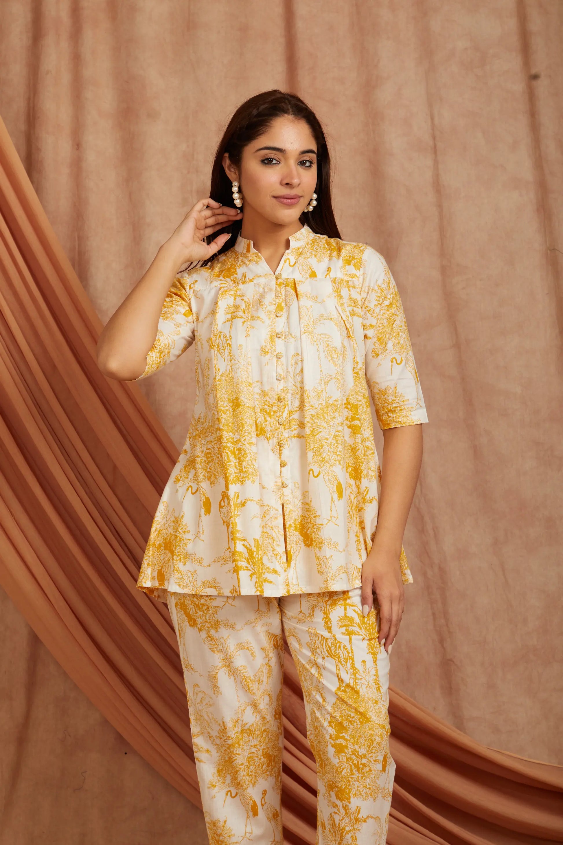 close‑up of yellow floral block print on breathable cotton fabric