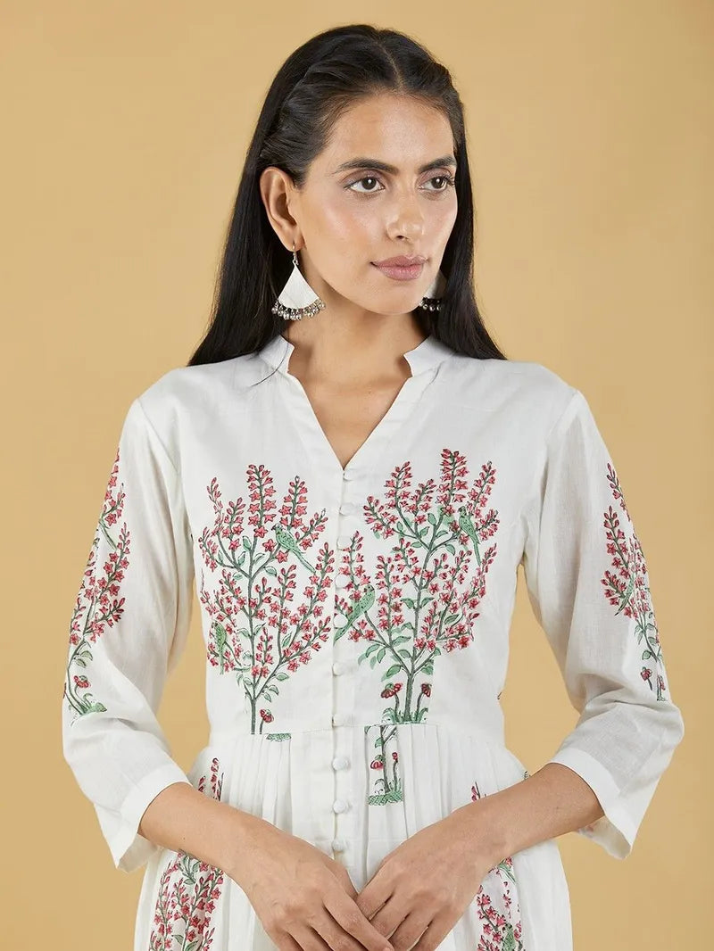 close‑up of red floral block print on mulmul fabric
