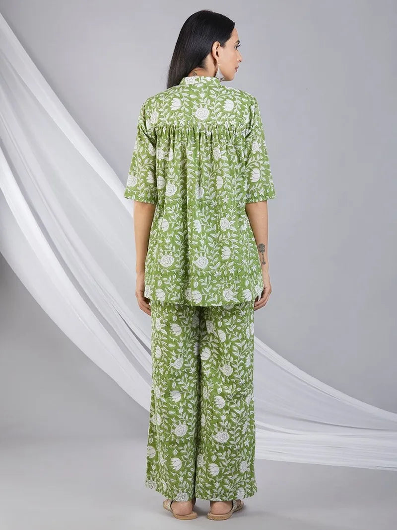 model wearing breathable green cotton co‑ord with palazzos
