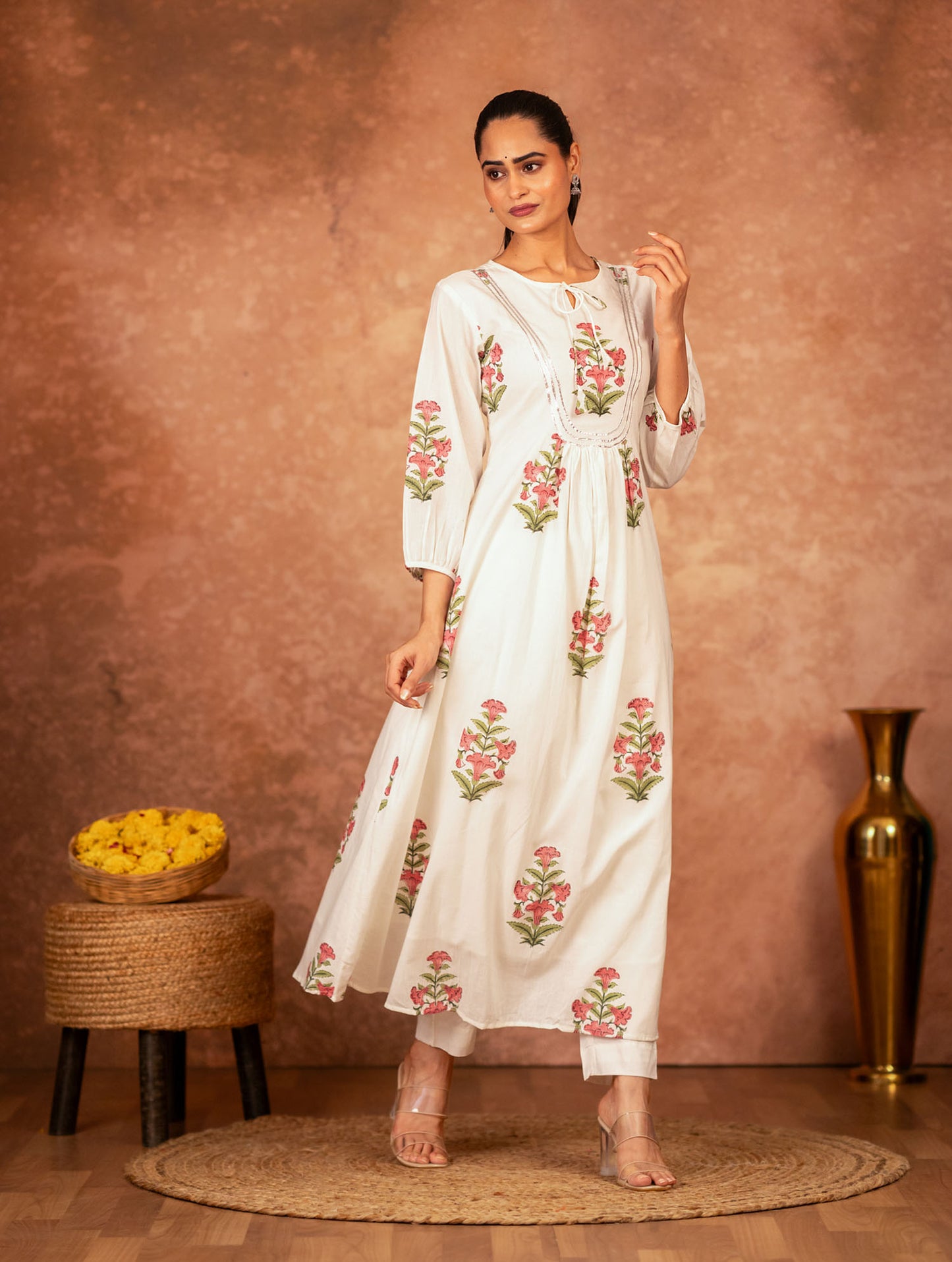 artisan floral design on off white cotton kurta with pink block print