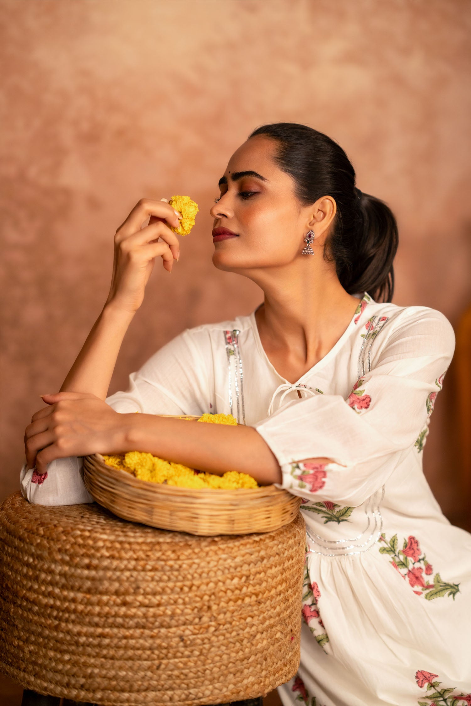 artisan floral design on off white cotton kurta with pink block print
