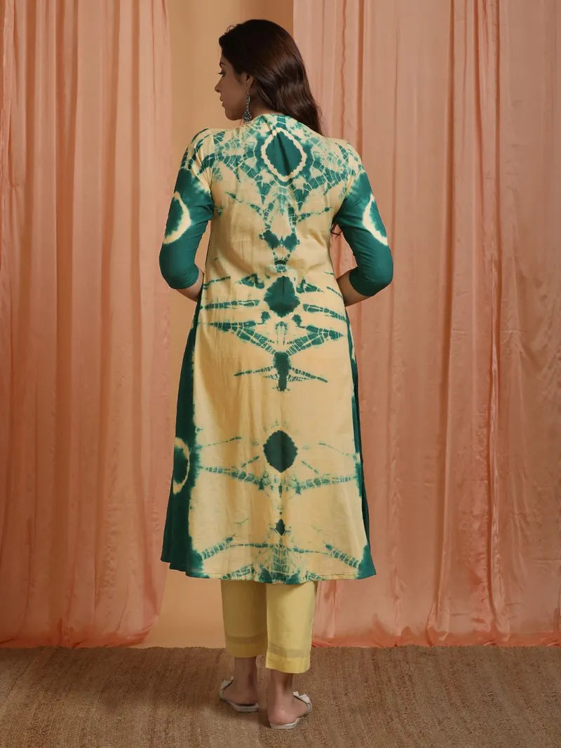 model wearing SIVI Collection green‑yellow tie‑and‑dye set