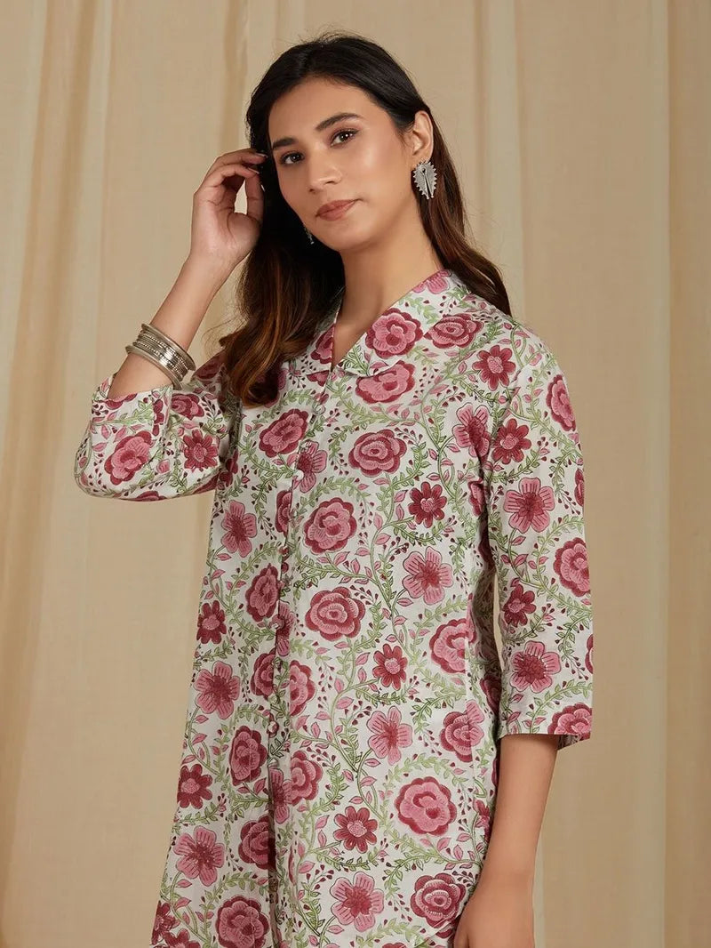 front view of floral block printed red and white top