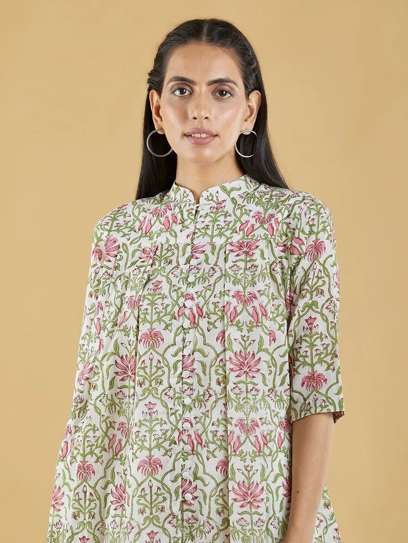 close-up of green and pink block print on cotton